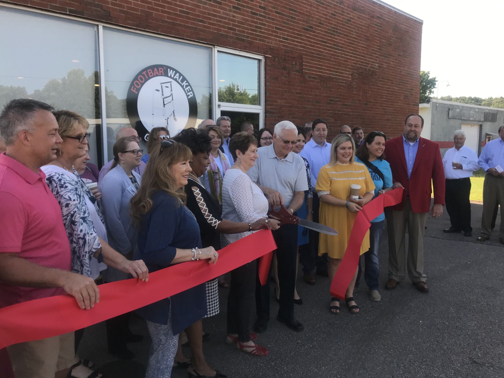 Morrises cut the ribbon at Footbar assembly plant